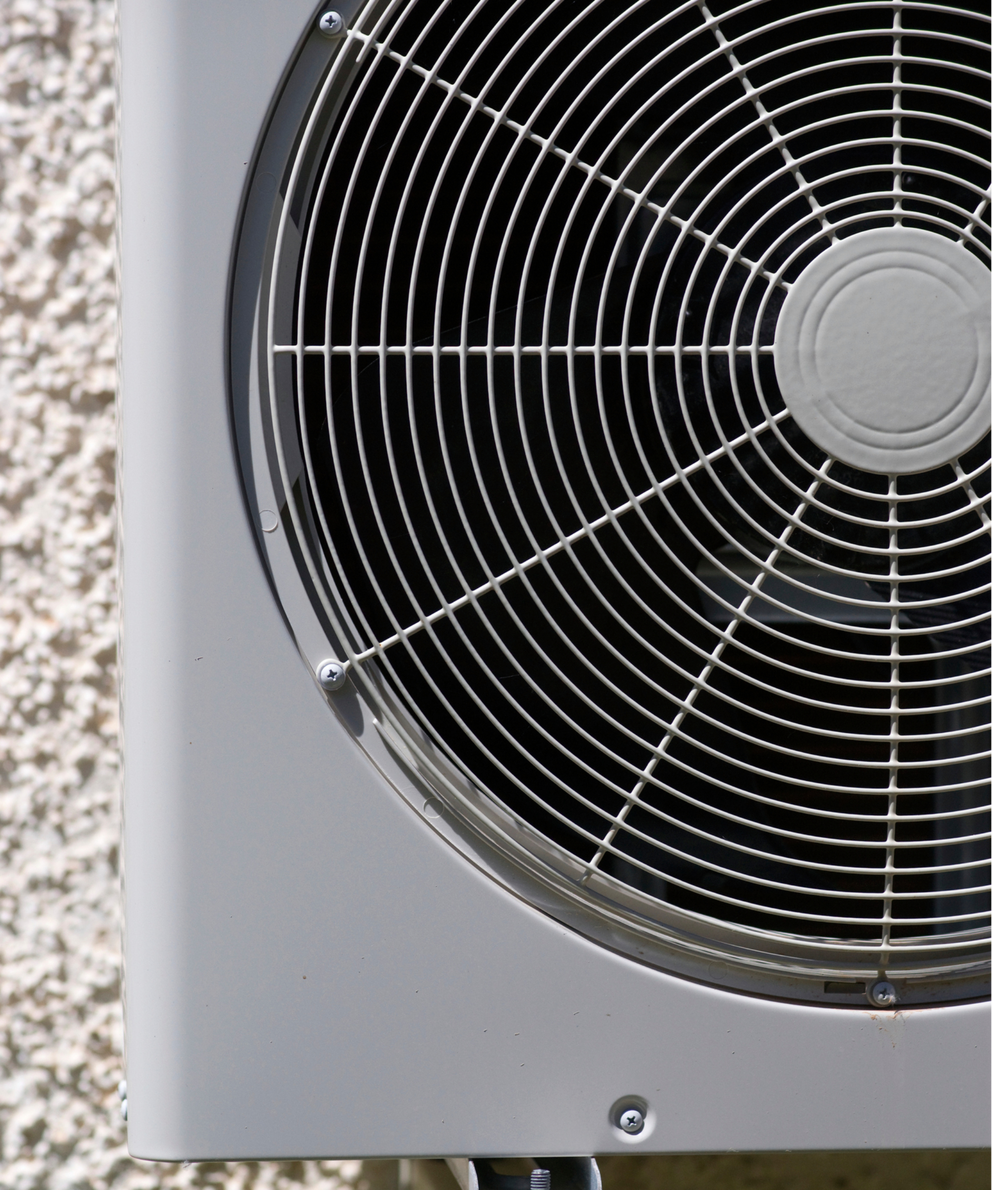 close up of corner of heat pump unit on wall