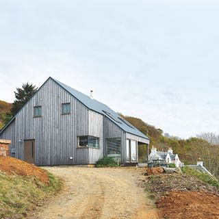 wood clad contemporary house on Scottish coast near Mull