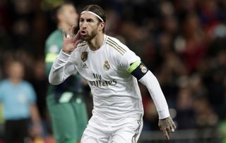 Real Madrid skipper Sergio Ramos celebrates after scoring from the penalty spot