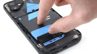 A Fairphone 5 being opened from iFixit.