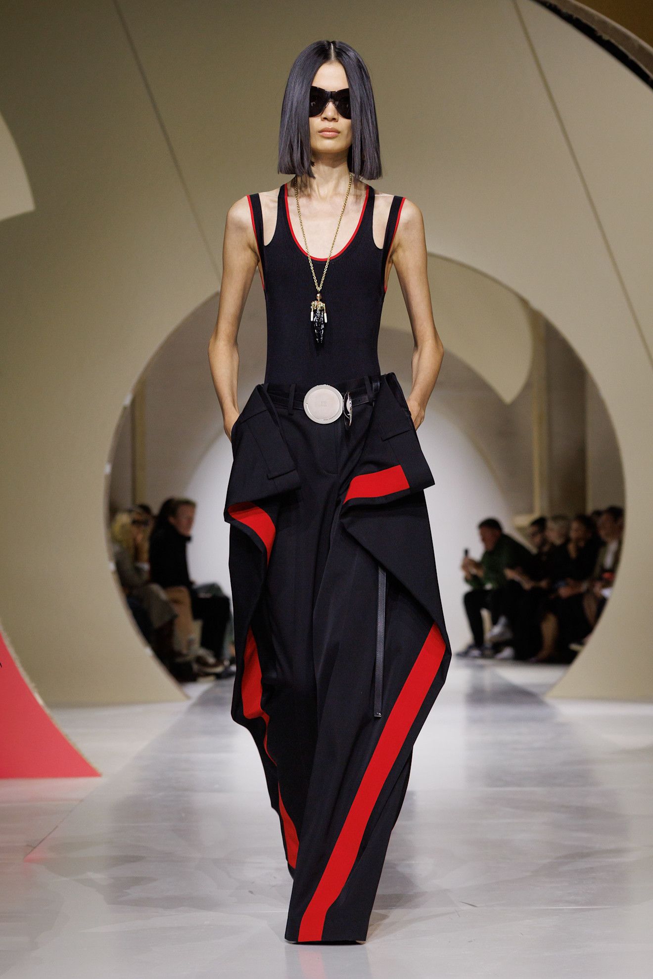 a model walks the givenchy runway.
