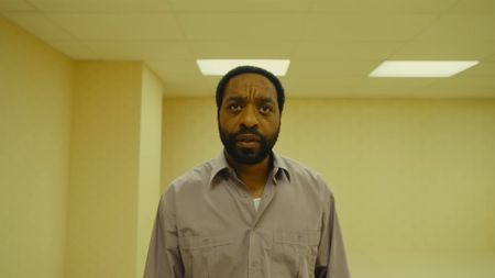 A24's The Backrooms trailer screenshot featuring protagonist looking confused in a pale yellow room