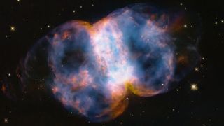 The nebula's shell is expanding at rates equivalent to traveling from Earth to the moon in just over seven minutes.