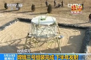 Chinese video shows work underway in preparing the Chang’e 3 moon lander mission.