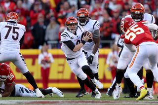  Quarterback Joe Burrow #9 of the Cincinnati Bengals scrambles with the ball against the Kansas City Chiefs in third quarter in the AFC Championship Game at Arrowhead Stadium on January 30, 2022 in Kansas City, Missouri. (Photo by Jamie Squire/Getty Images)
