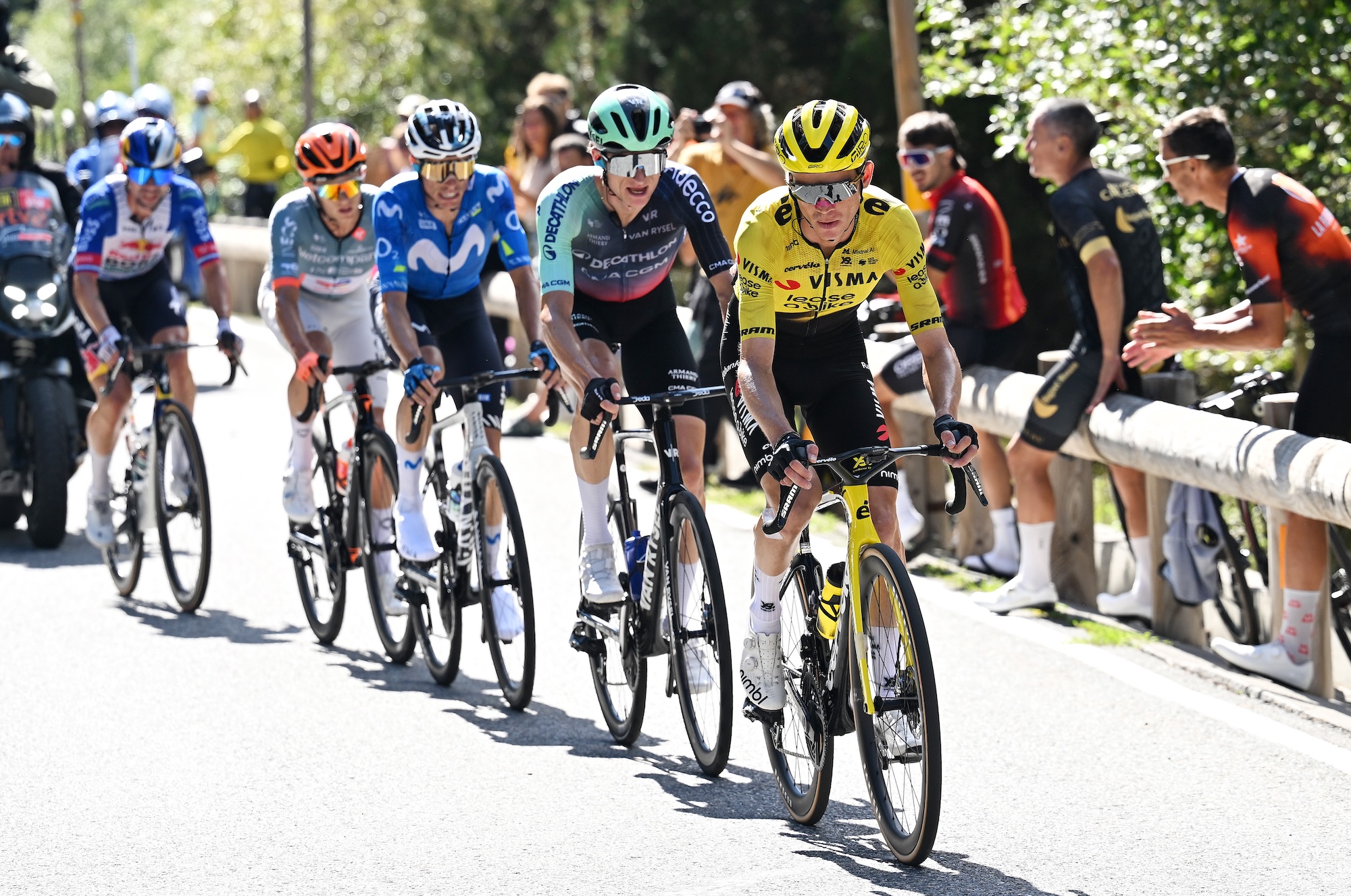 Sepp Kuss leads Felix Gall and Enric Mas in the chase group behind Tadej Pogačar on the road to Andorra la Vella on stage 4 of the Vuelta a Espa&ntilde;a