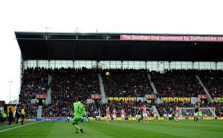 Asmir Begovic of Stoke City takes a free-kick during the Barclays Premier League match between Stoke City and Southampton on November 02, 2013 in Stoke on Trent, England.