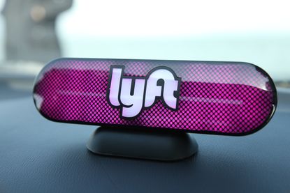 A Lyft driver's car dash