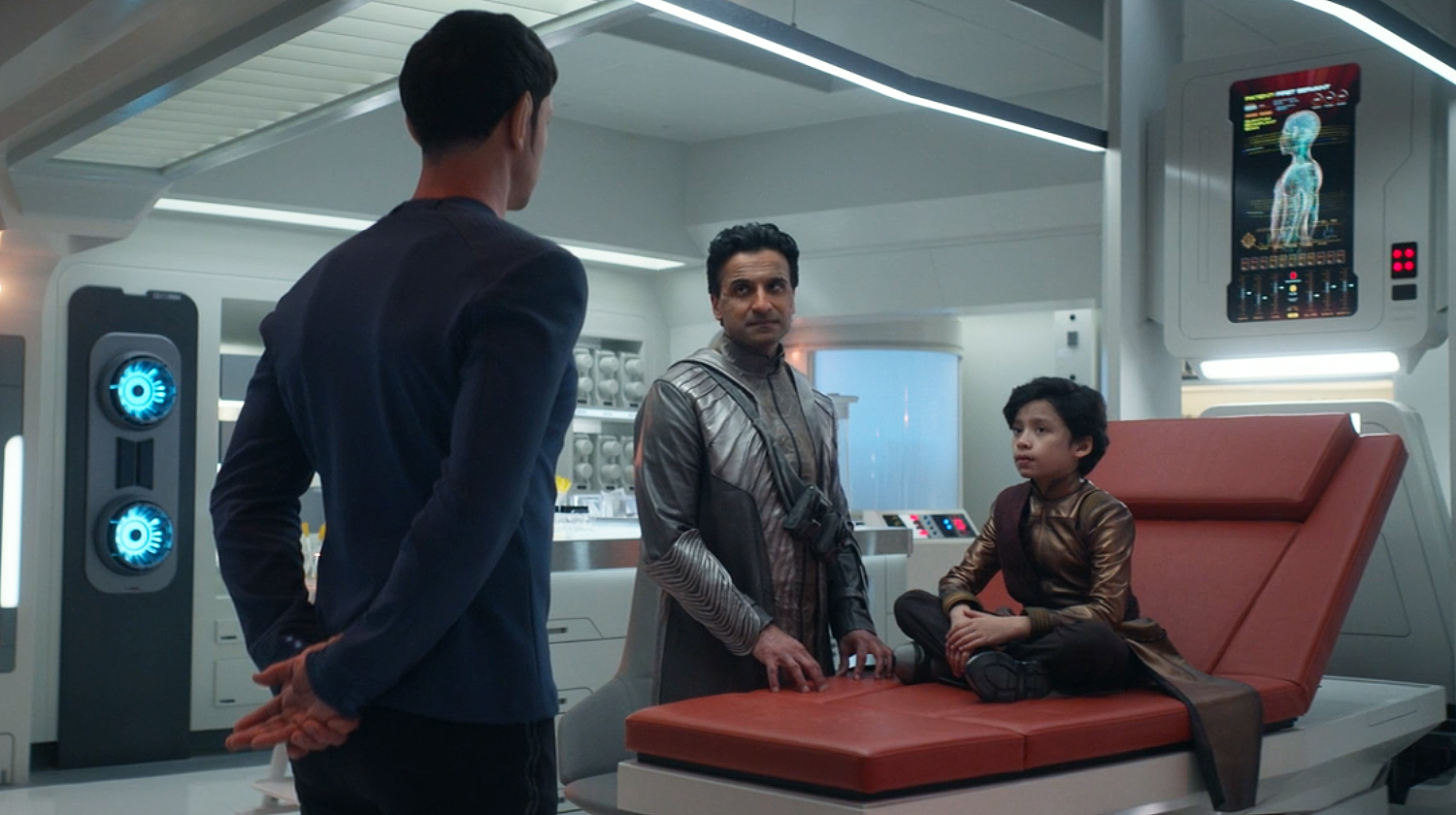 Spock in the infirmary with the young First Servant of the Majalan people.