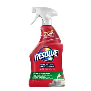 A side on image of a red bottle of Resolve Upholstery Cleaner & Stain Remover with white spray lid