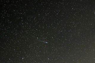 Comet Lovejoy C/2013 R1 and a "spark" of a meteor on December 12, 2013.