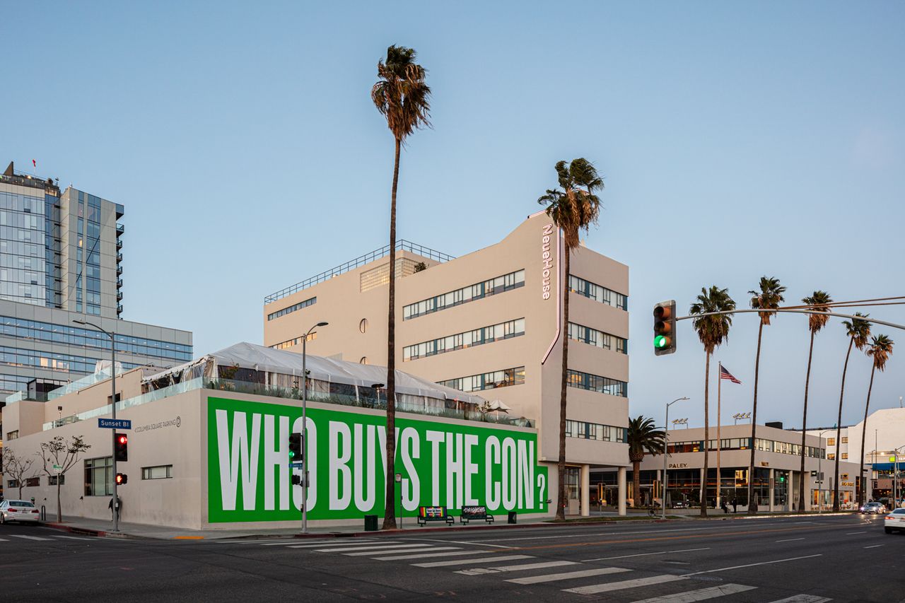 Barbara Kruger&#039;s &#039;Who Buys The Con&#039; installation on NeueHouse Hollywood façade during Frieze LA