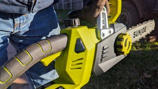 There are two handles on the machine – one in the front and one in the back. A two-hand grip is always better with yard tools.