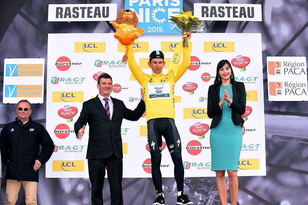 Michal Kwiatkowski (Etixx-QuickStep) on the stage 5 podium as the race leader