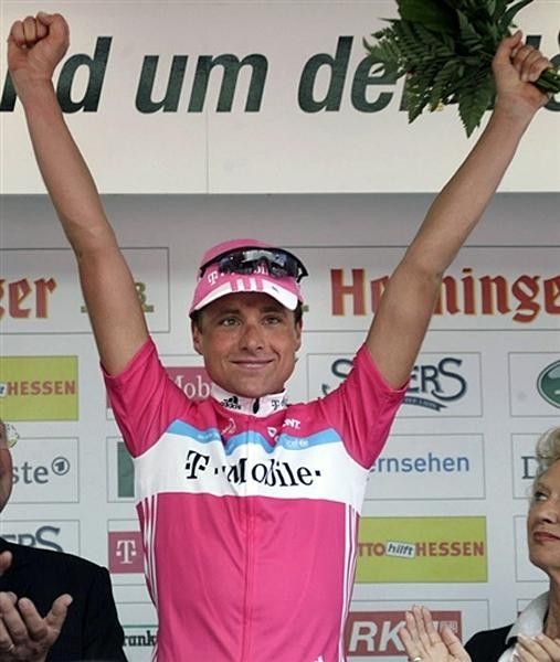 Patrik Sinkewitz celebrates on the podium