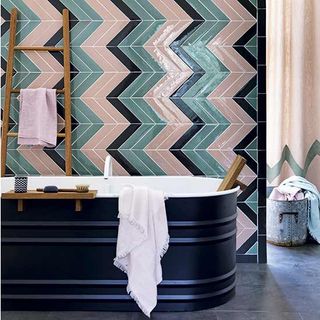 bathroom with teal and pink wall decor