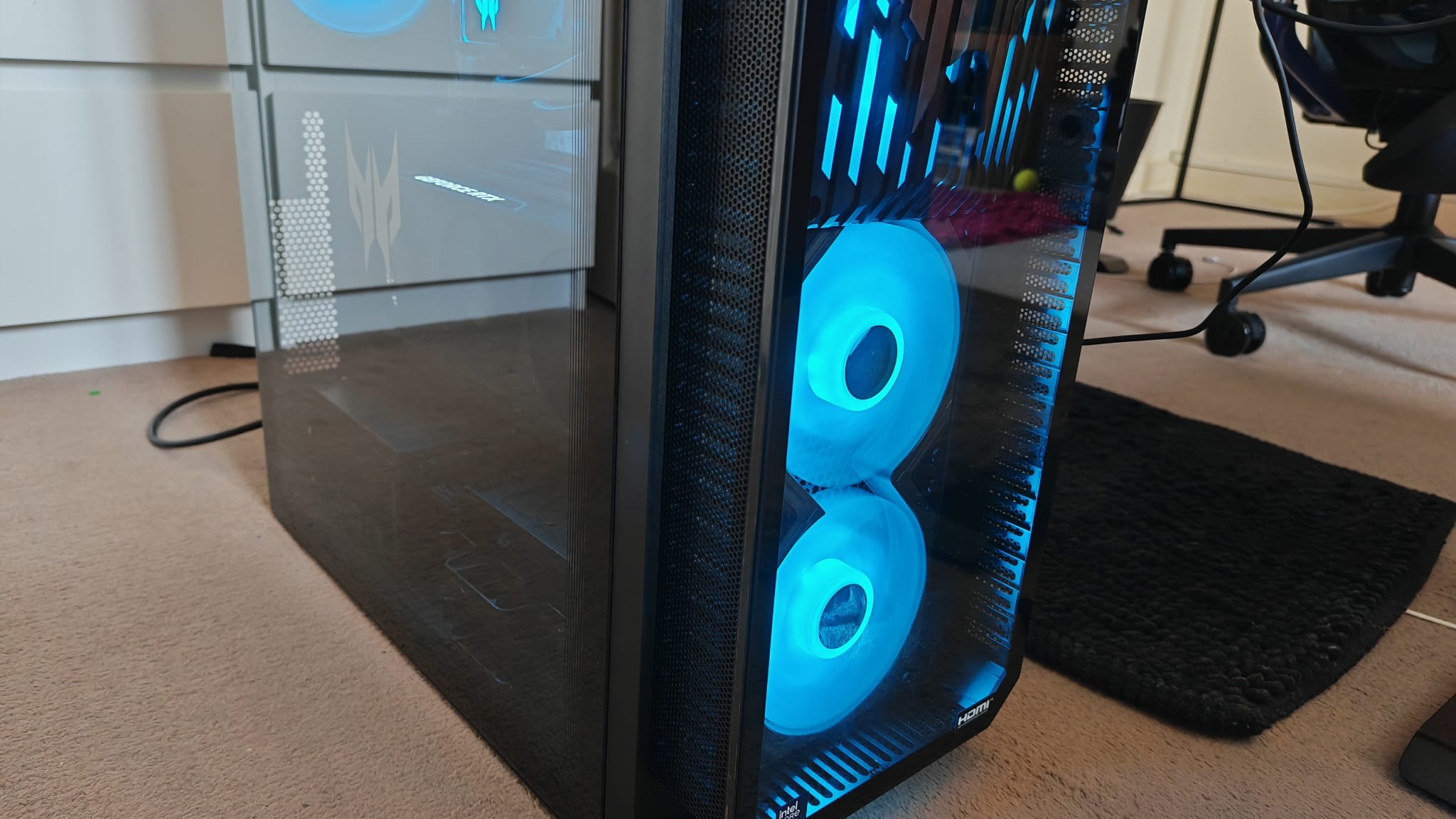 The front fans on the Acer Predator Orion 7000 (2025) glowing blue