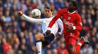 LIVERPOOL - OCTOBER 26: Goran Bunjevcevic of Totteham Hotspur and Salif Diao of Liverpool in action during the FA Barclaycard Premiership match between Liverpool and Tottenham Hotspur at Anfield on October 26, 2002 in Liverpool, England. (Photo by Shaun Botterill/Getty Images)