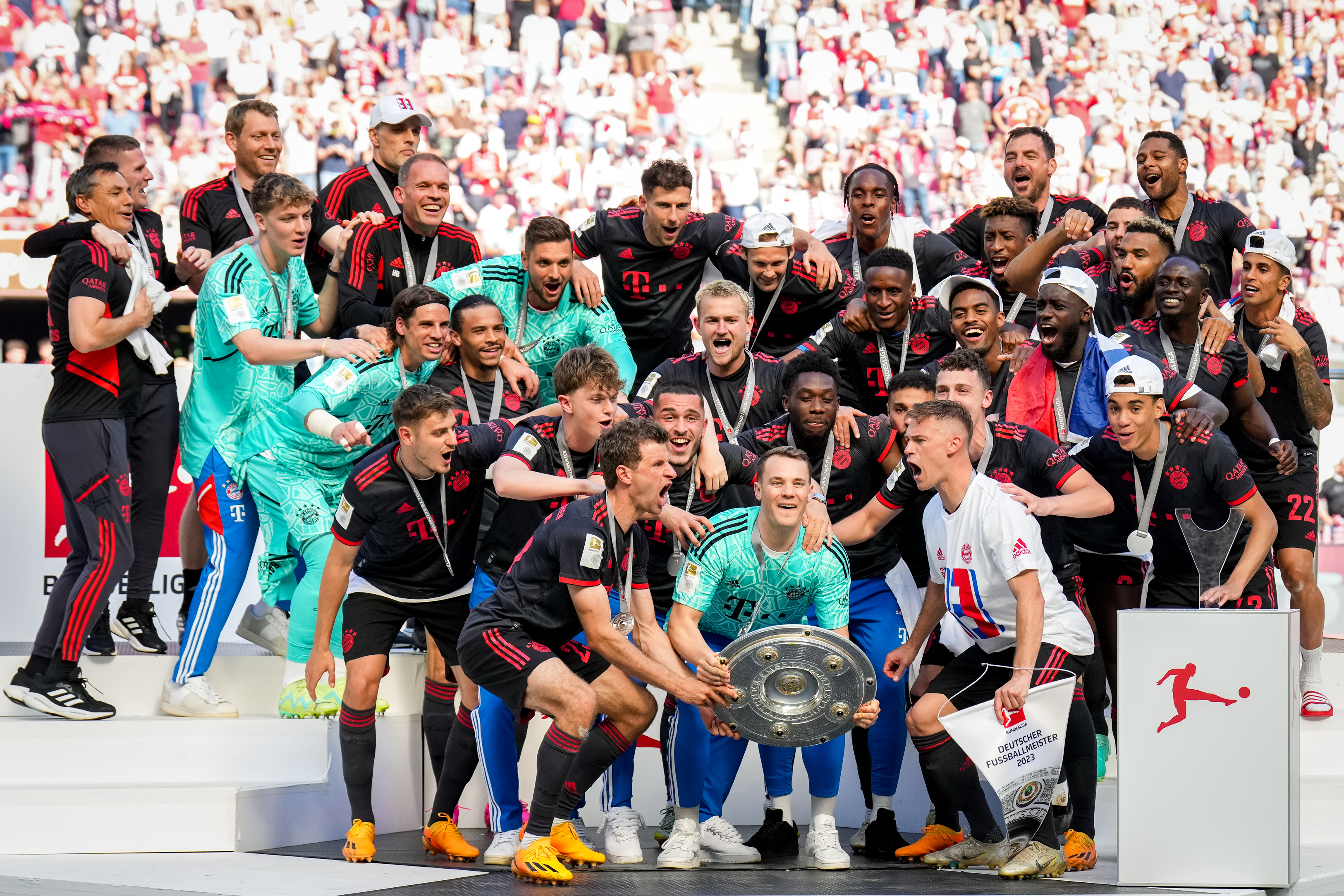 Bayern Munich players celebrate in May 2023 after winning the Bundesliga for the 11th season in a row.