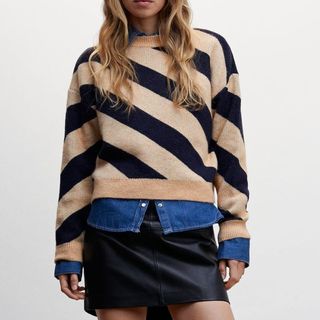 model wearing mango diagonal striped sweater