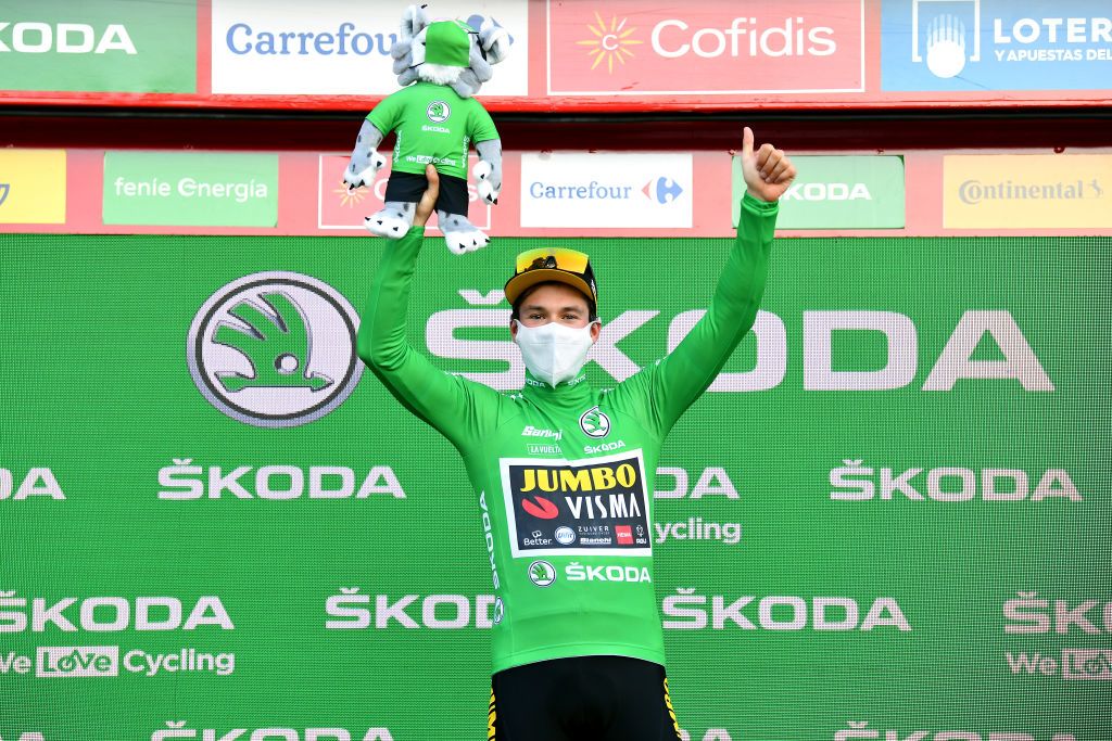 SUANCES SPAIN OCTOBER 30 Podium Primoz Roglic of Slovenia and Team Jumbo Visma Green Points Jersey Celebration Mascot Mask during the 75th Tour of Spain 2020 Stage 10 a 185km stage from Castro Urdiales to Suances lavuelta LaVuelta20 La Vuelta on October 30 2020 in Suances Spain Photo by Justin SetterfieldGetty Images