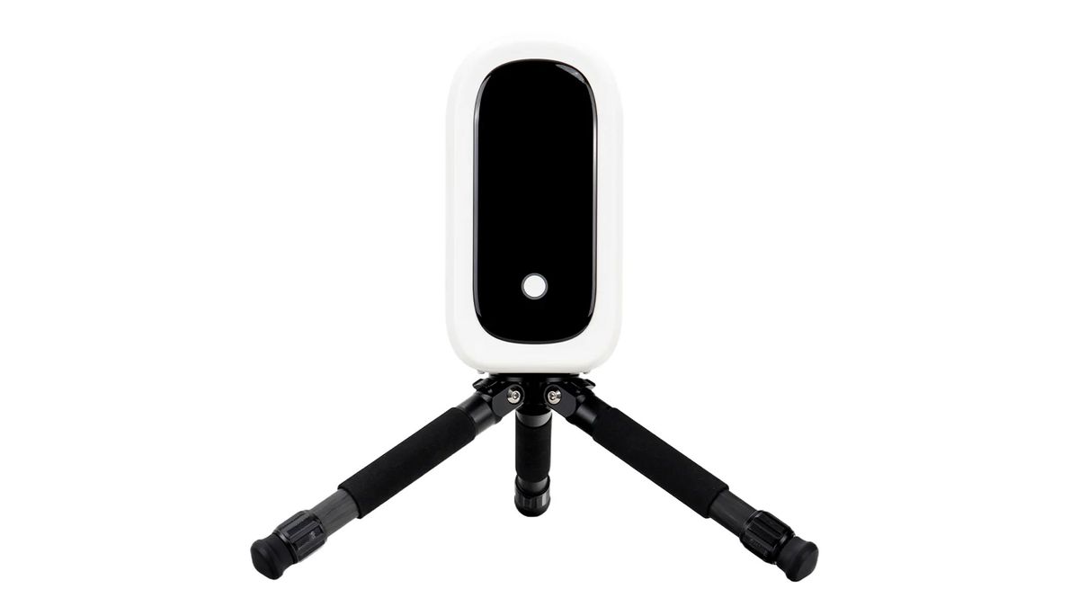 The ZWO Seestar S50 Pro smart telescope on a small black tripod, showing the power button, against a white background.