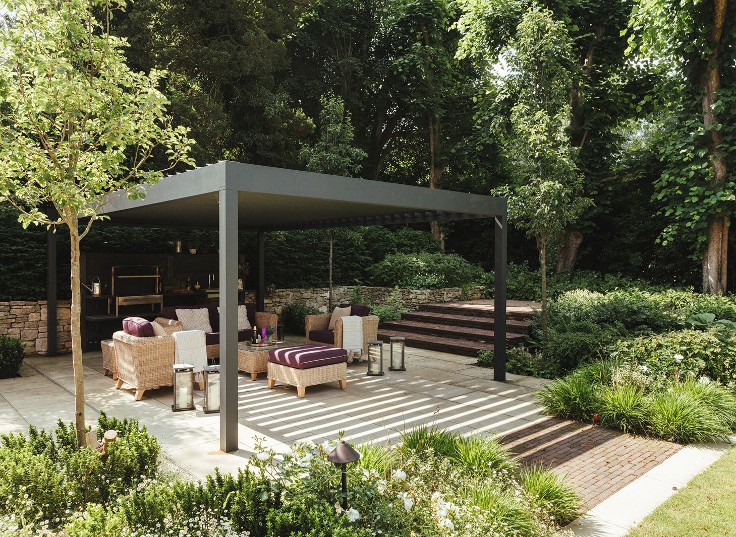Renson Canopy Pergola over a seating area in a garden