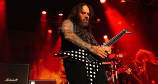 Phil Demmel plays a polka-dotted Jackson V onstage in London with Kerry King's new band