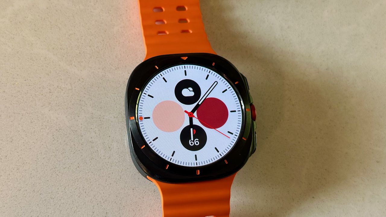 The Samsung Galaxy Watch Ultra sitting on a white counter, showing the Color Duo watch face.