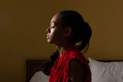 Mental health help: Side view of young woman with eyes closed