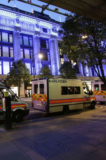 Police vans outside Selfridges on Oxford Street