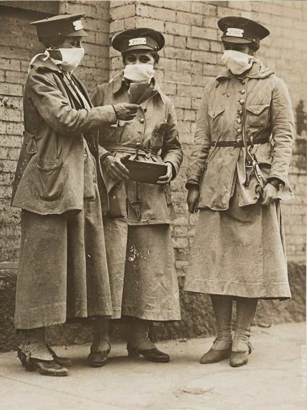 Female conductors wearing influenza masks, New York, 1918