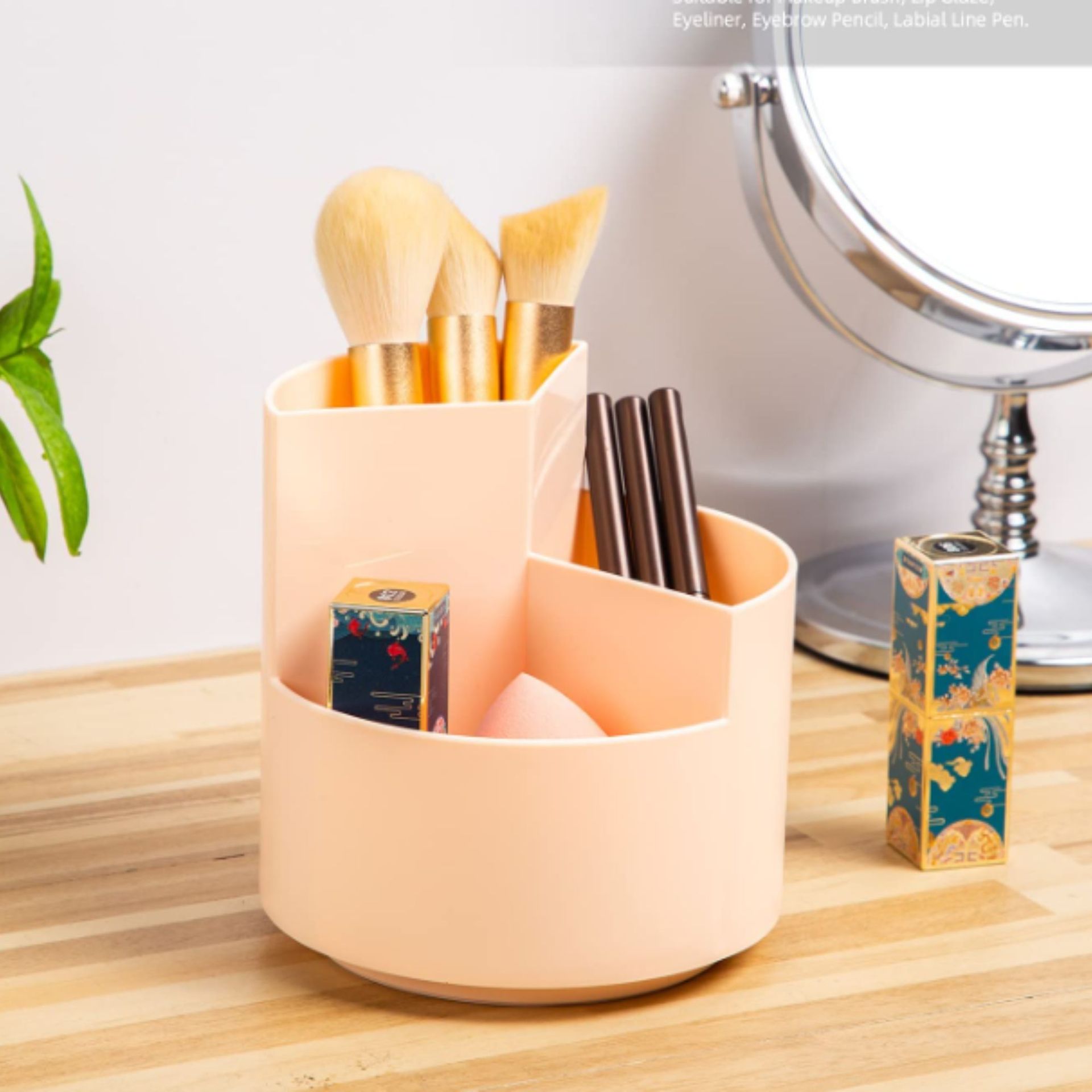 Penyelenggara meja berputar merah muda di atas meja