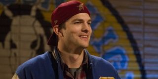Colt Bennett (Ashton Kutcher) smiles on The Ranch