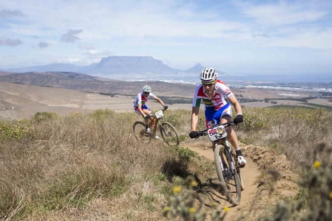 Jaroslav Kulharvy(Czech Republic) and Christoph Sauser(Switzerland) of Burry Stander-Songo take the prologue win