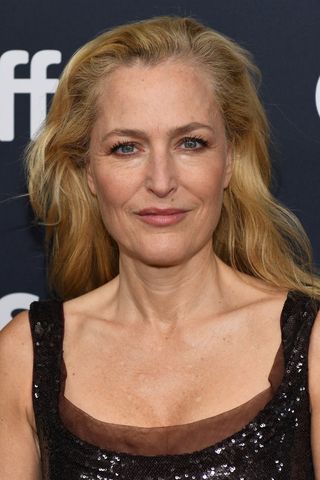 Gillian Anderson is pictured with a warm smoky eye makeup look at the premiere of "The Salt Path" during the 2024 Toronto International Film Festival at Royal Alexandra Theatre on September 12, 2024 in Toronto, Ontario.