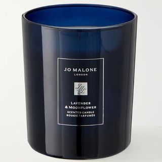 A dark blue candle jar