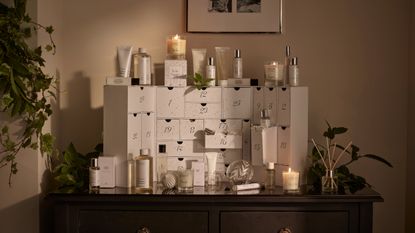 The White Company advent calendar with contents in and around it