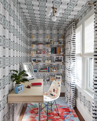 a wallpapered home office