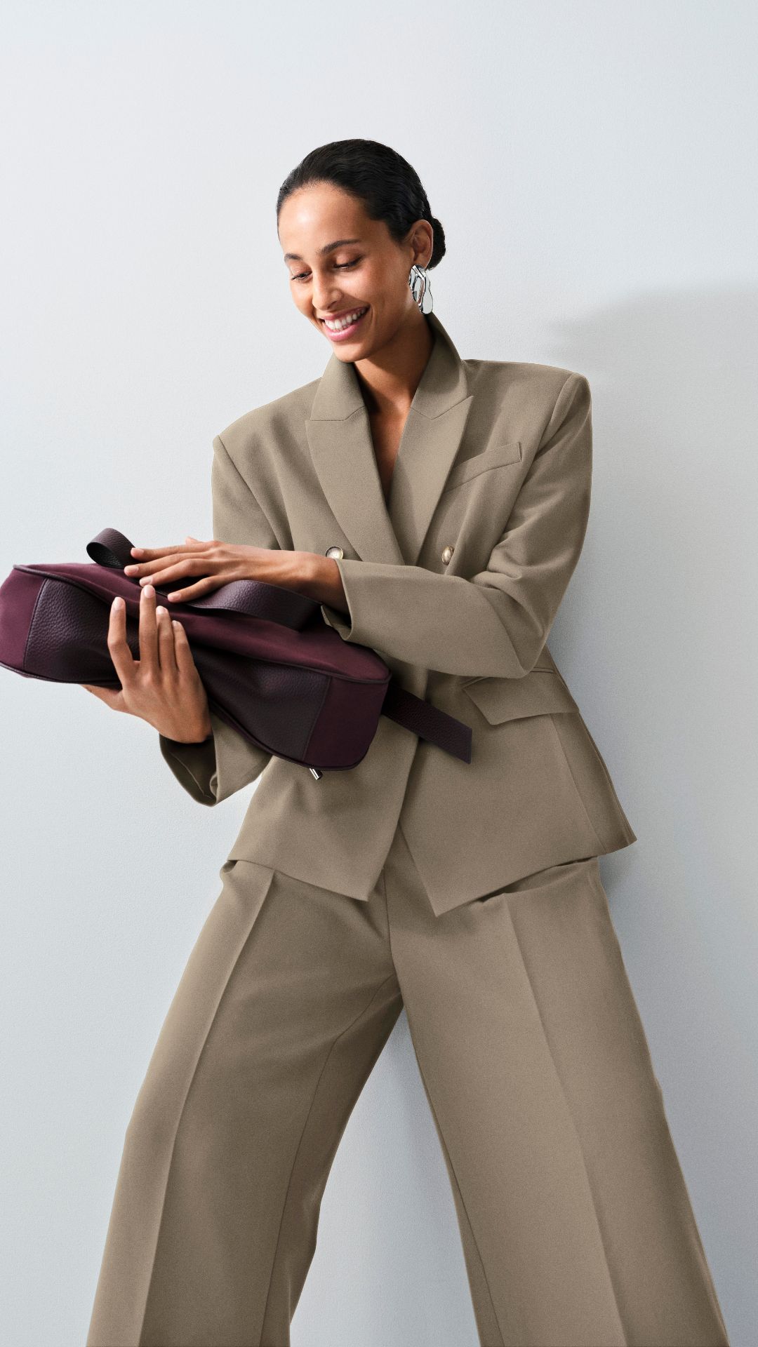 a model wearing F&amp;amp;F blazer and trouser