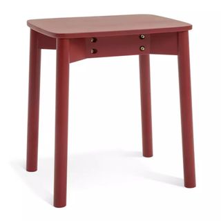 red wooden stool