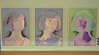 The three self-portraits created by Ai-Da.