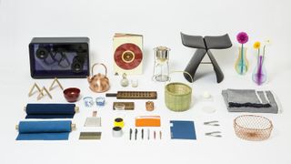 A still life composition made of stationery products from Japan stands out colorfully against a plain white background.