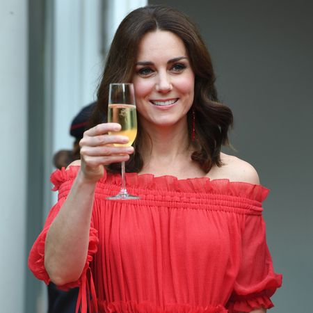 Princess Kate raising a glass of champagne