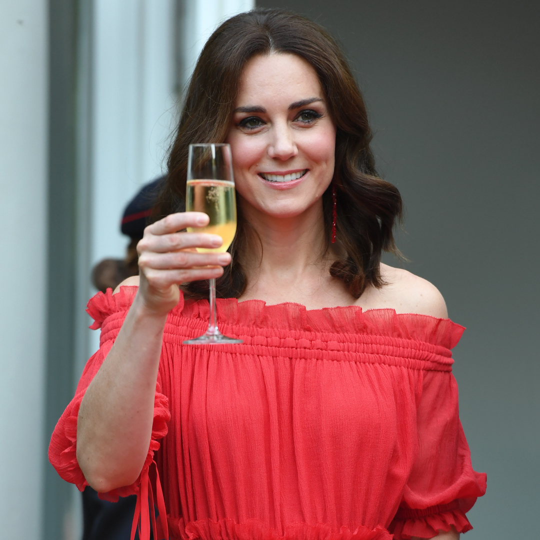 Princess Kate raising a glass of champagne