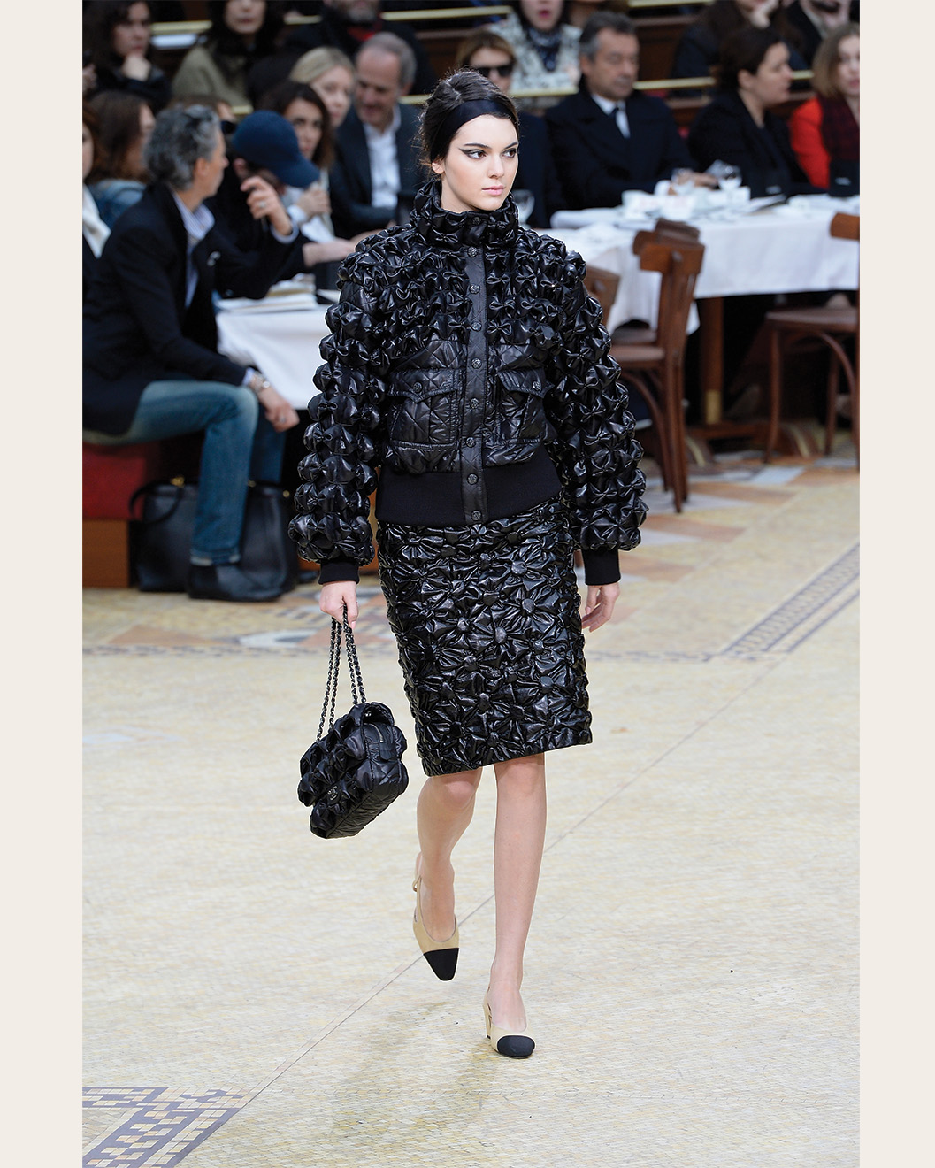 An image of Kendall Jenner wearing Chanel slingbacks on Chanel's autumn/winter 2025 runway.