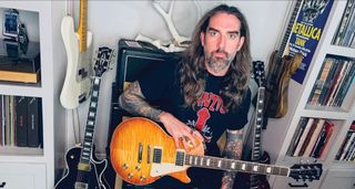 Nate Garrett of Spirit Adrift is pictured with his Les Paul