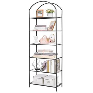 A black framed six tier bookshelf with an arched top