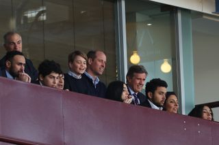 Prince William and Prince George watch Aston Villa play