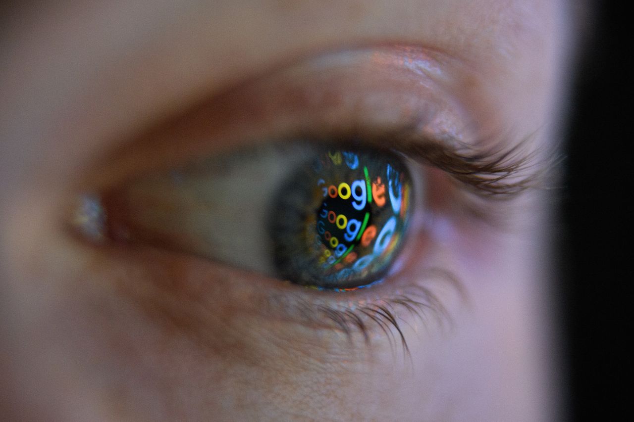 The Google logo reflected in person&amp;#039;s eye.